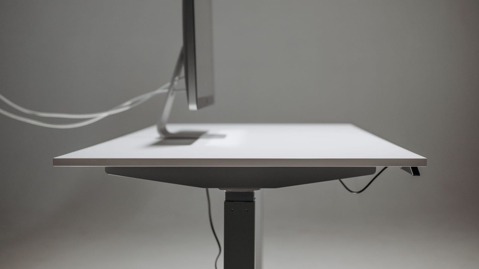 A desk with a motor, and a chair that never needed one