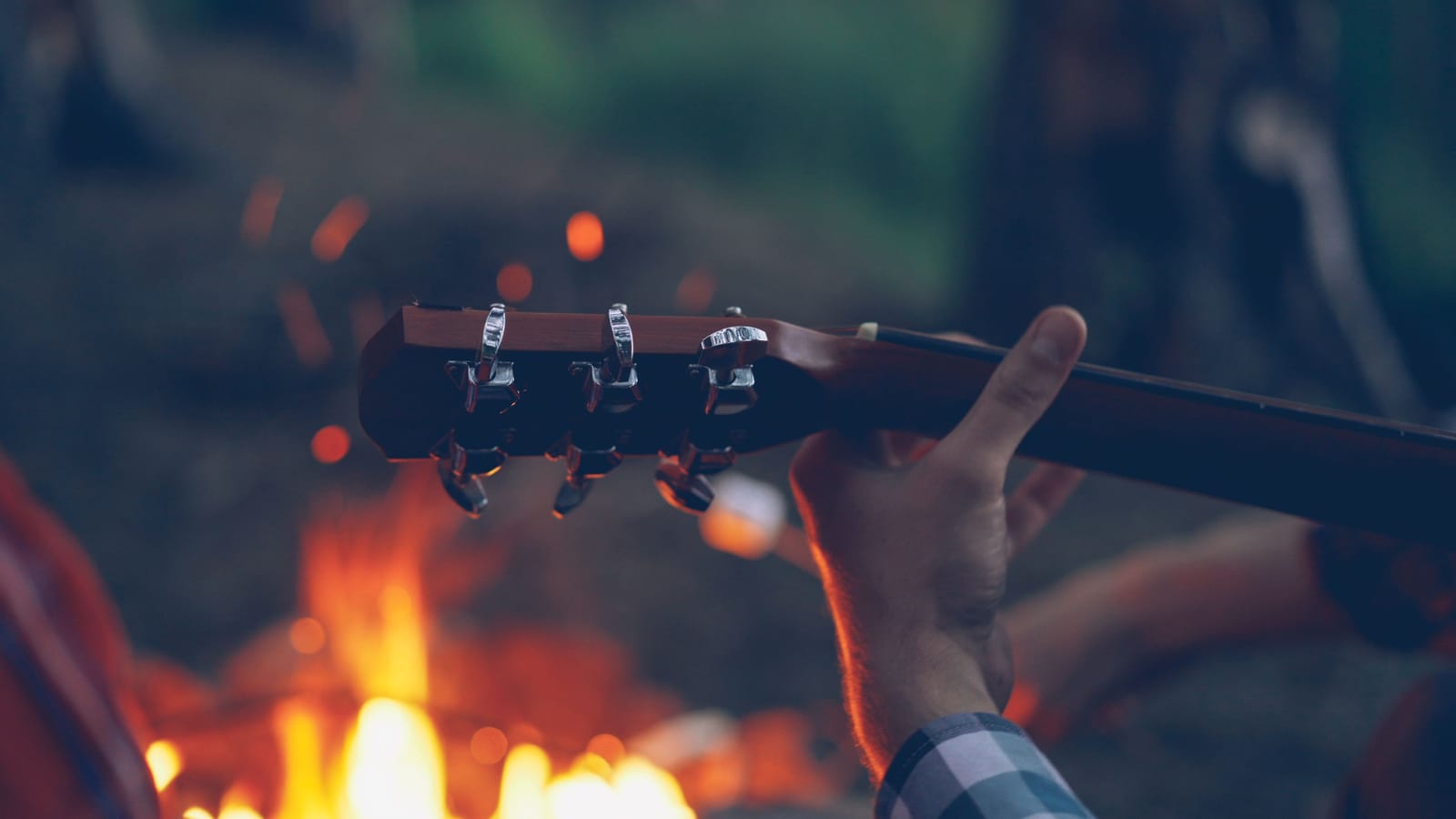 Country Songs Worth Memorizing Before Someone Hands You a Guitar
