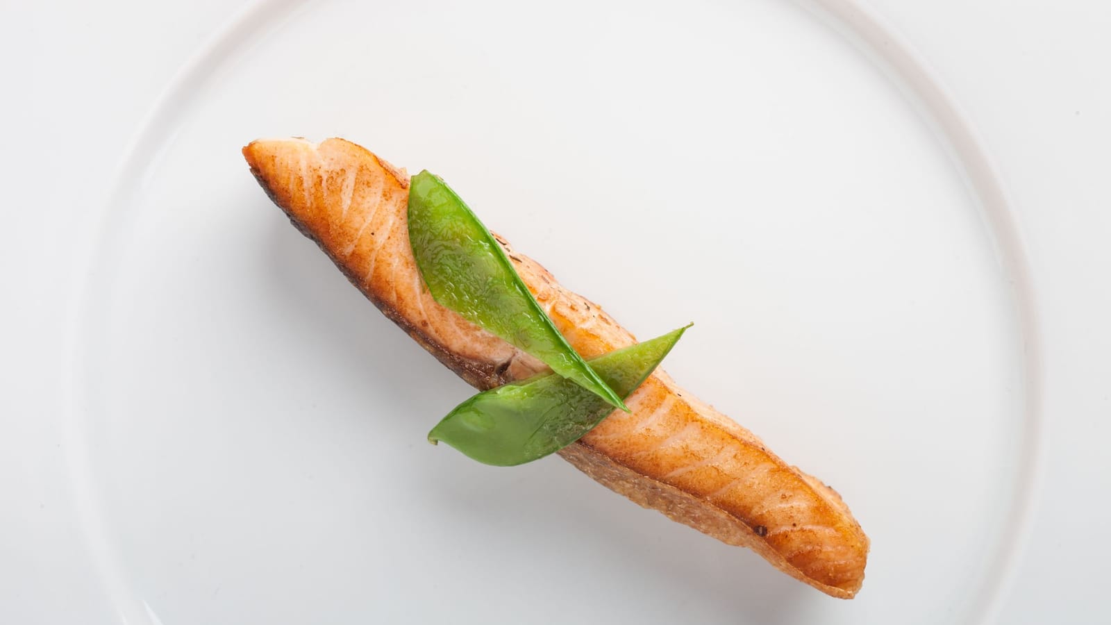 If you eat oily fish twice a week, skip the fish oil