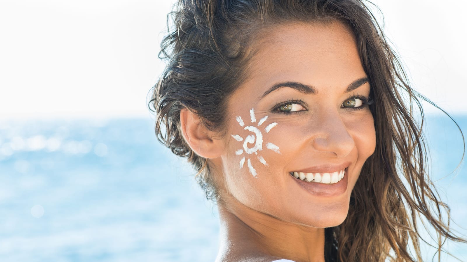 Wear more sunscreen, buy fewer products