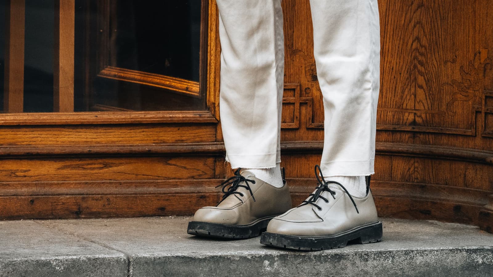 Your trouser hem is probably an inch off, and it shows